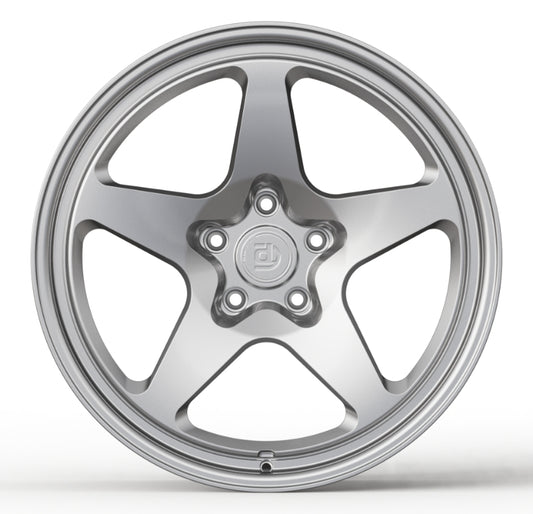 Silver alloy wheel on a white background