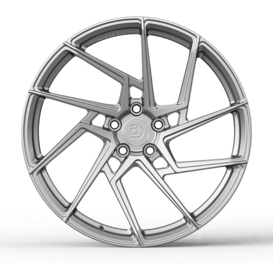 Silver alloy wheel on a white background
