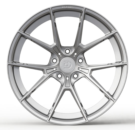 Silver alloy wheel on a white background
