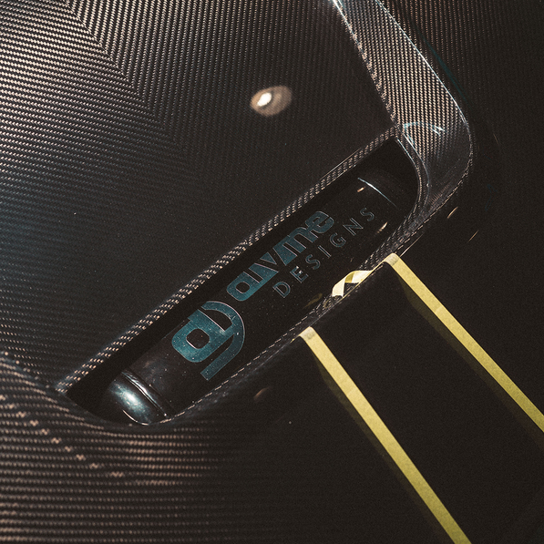 Carbon fiber Porsche hood with Divine Designs branding