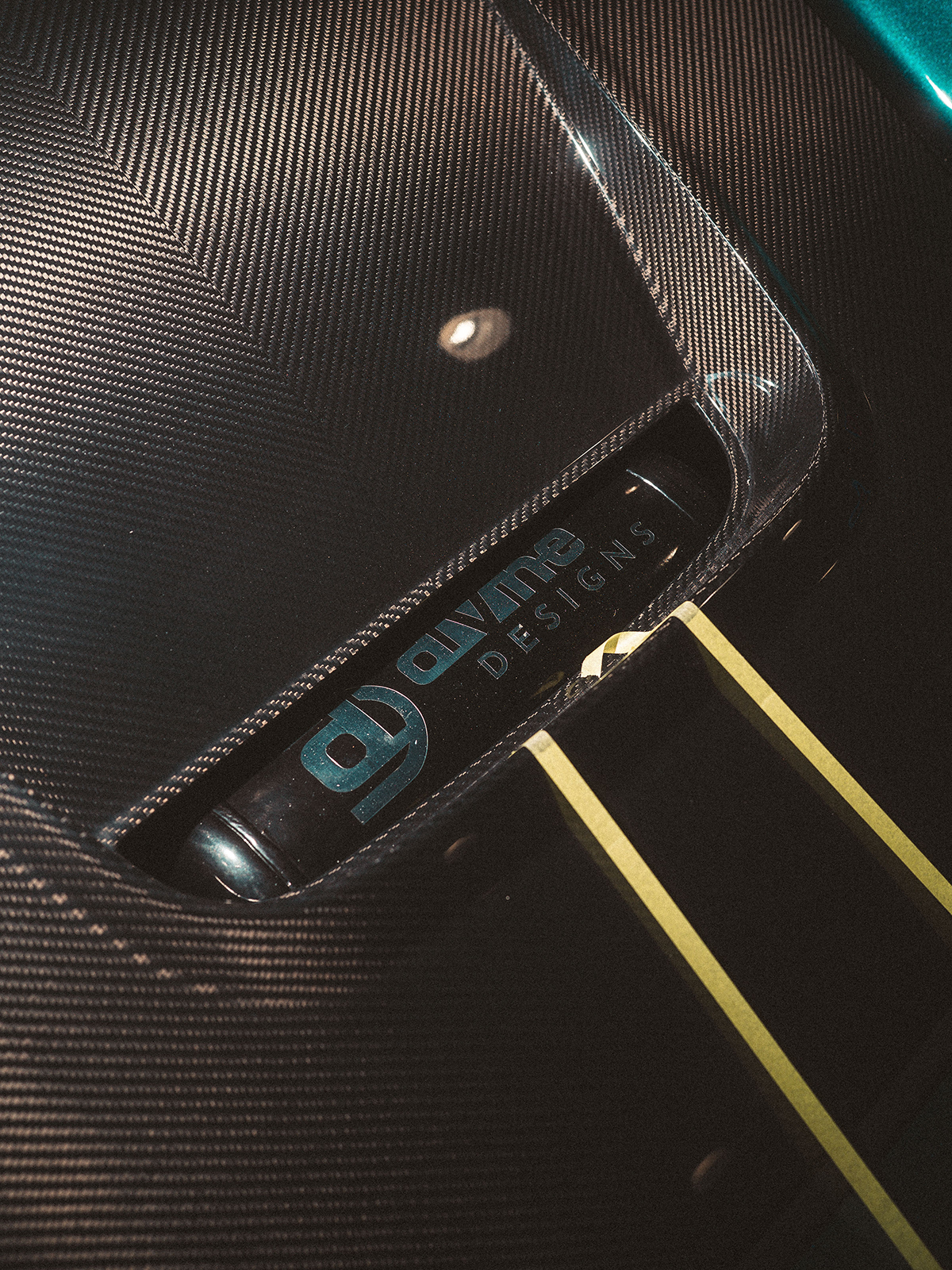 Carbon fiber Porsche hood with Divine Designs branding