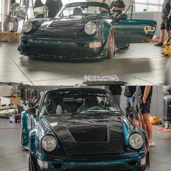 Two views of a green sports car in a garage with people around.