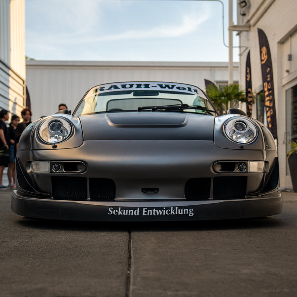 Front view of a Porsche Rauh-Welt Begriff car with visible branding.