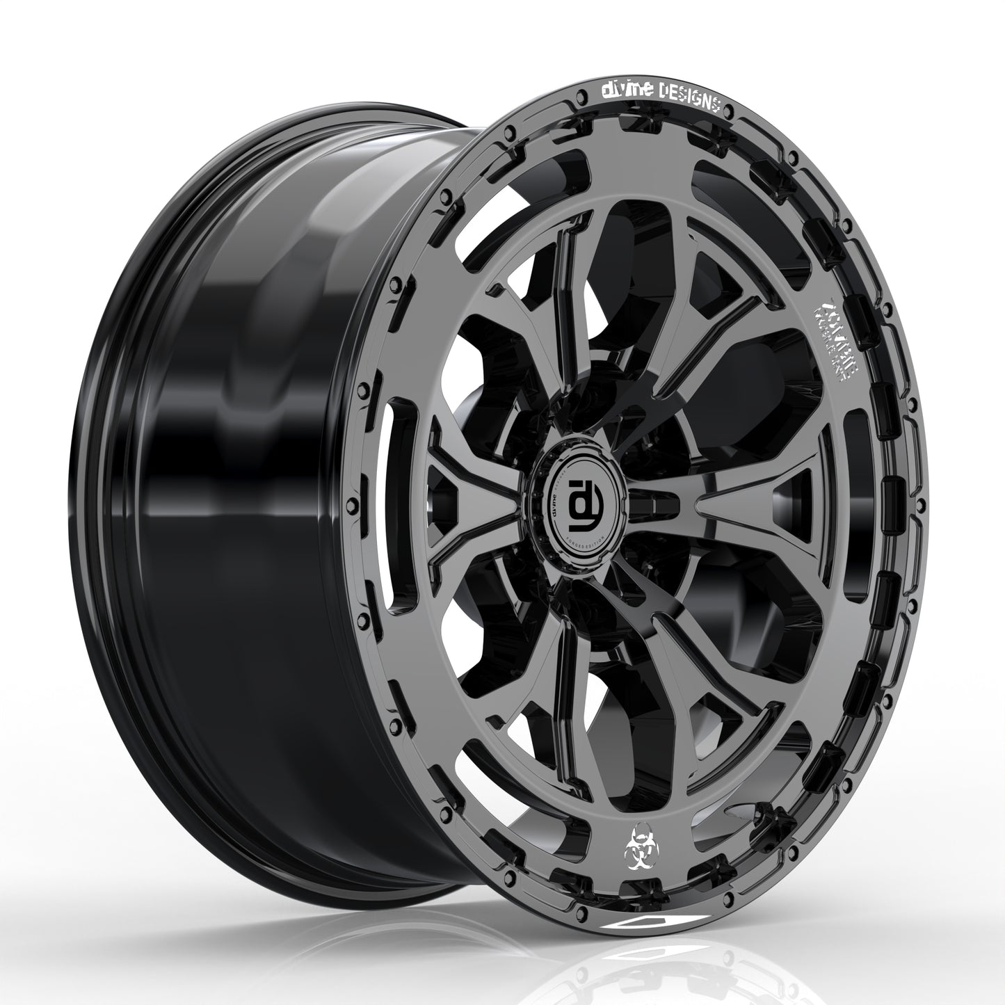 Black alloy wheel with intricate design on a white background