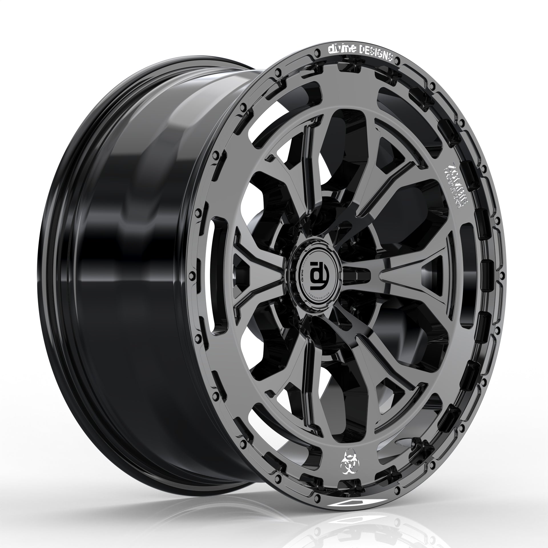 Black alloy wheel with intricate design on a white background