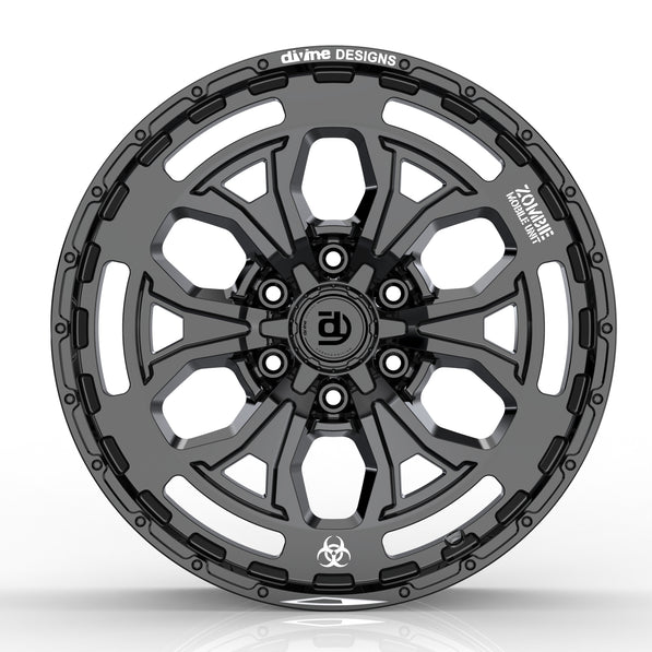 Black alloy wheel with 'divine DESIGNS' branding on a white background