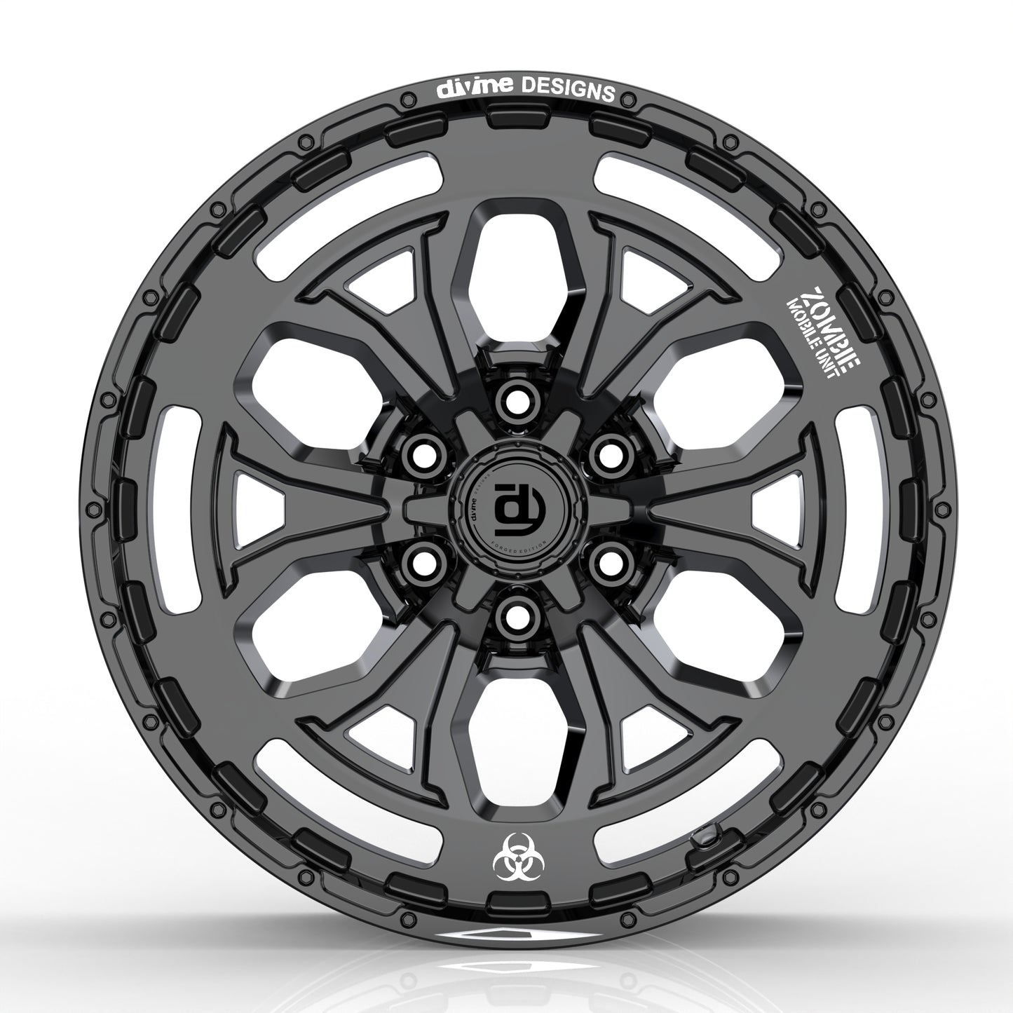 Black alloy wheel with 'divine DESIGNS' branding on a white background