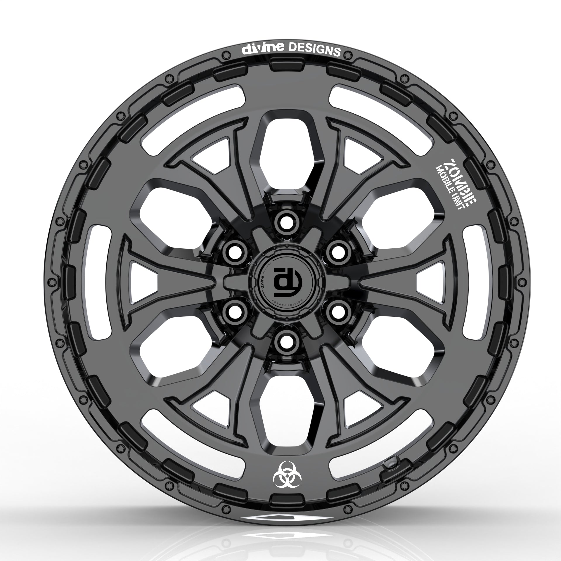 Black alloy wheel with 'divine DESIGNS' branding on a white background