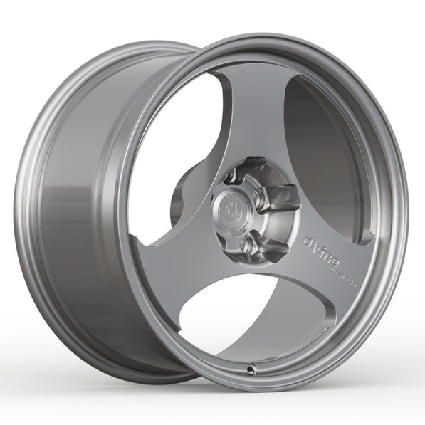 Silver alloy wheel on a white background