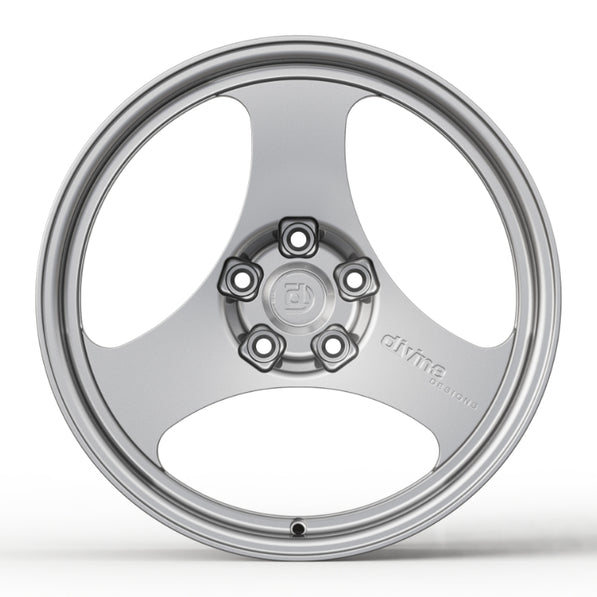 Silver alloy wheel on a white background