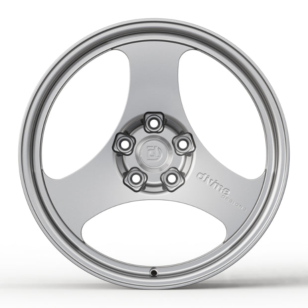 Silver alloy wheel on a white background