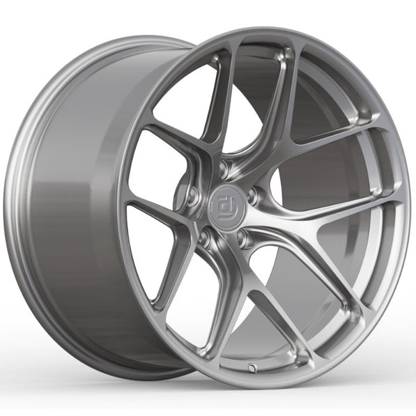 Silver alloy wheel on a white background