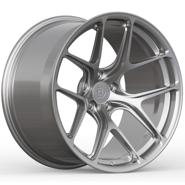 Silver alloy wheel on a white background