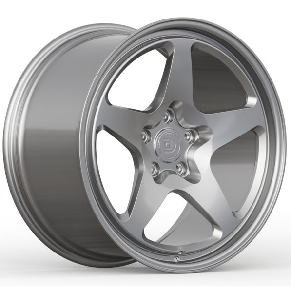 Silver alloy wheel on a white background