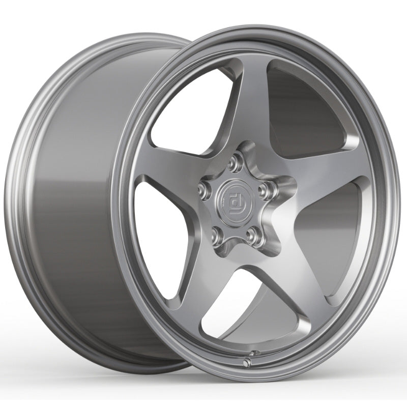 Silver alloy wheel on a white background