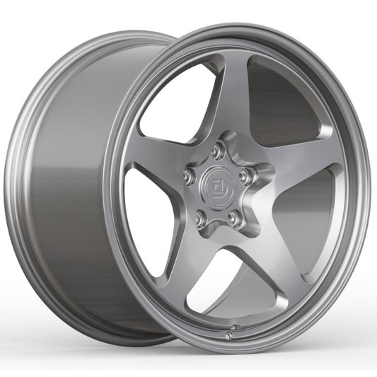 Silver alloy wheel on a white background