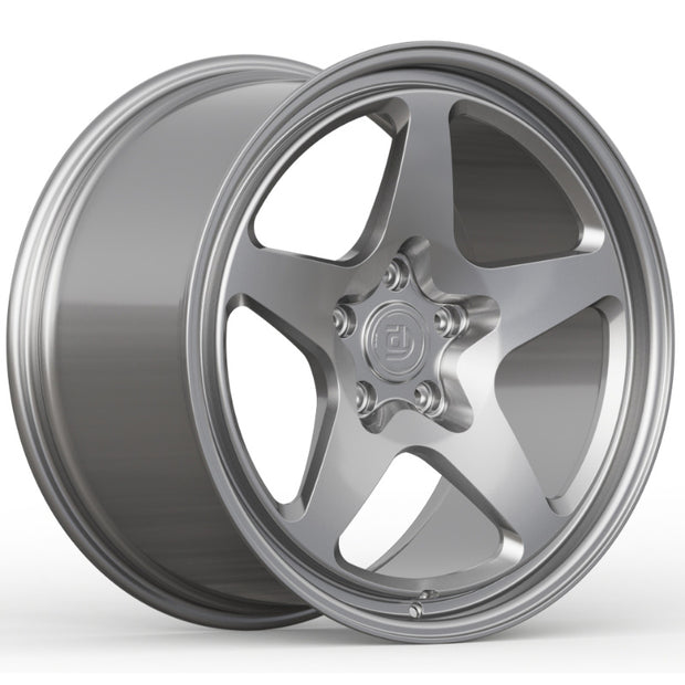 Silver alloy wheel on a white background