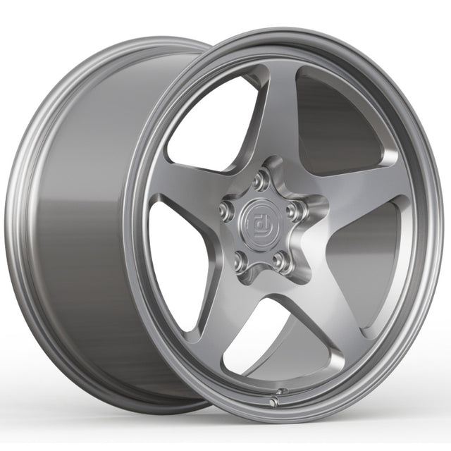 Silver alloy wheel on a white background