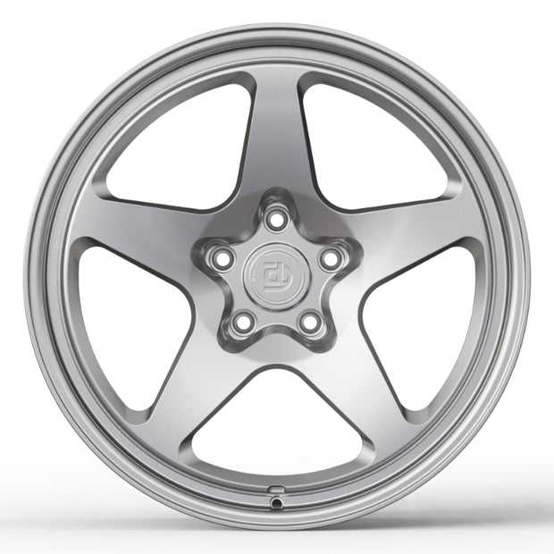 Silver alloy wheel on a white background