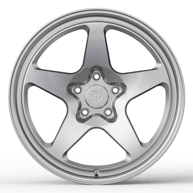 Silver alloy wheel on a white background