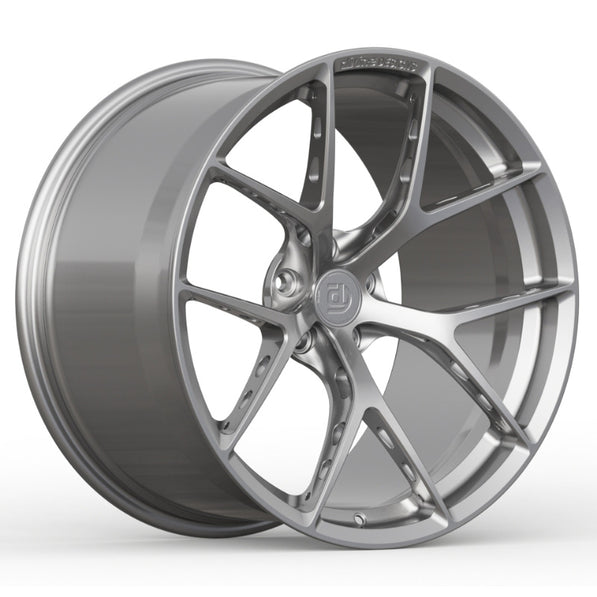 Silver alloy wheel on a white background