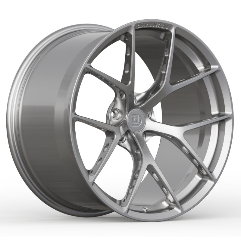 Silver alloy wheel on a white background