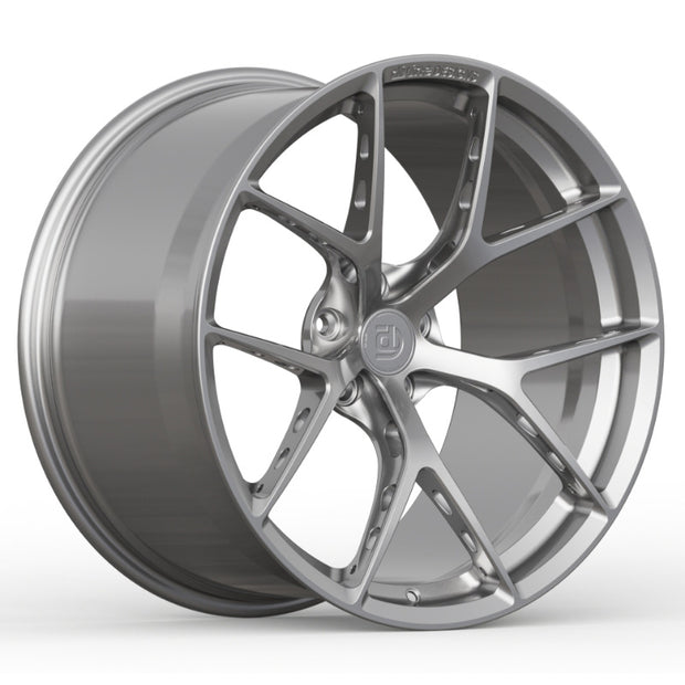 Silver alloy wheel on a white background