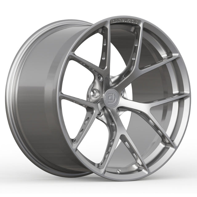 Silver alloy wheel on a white background