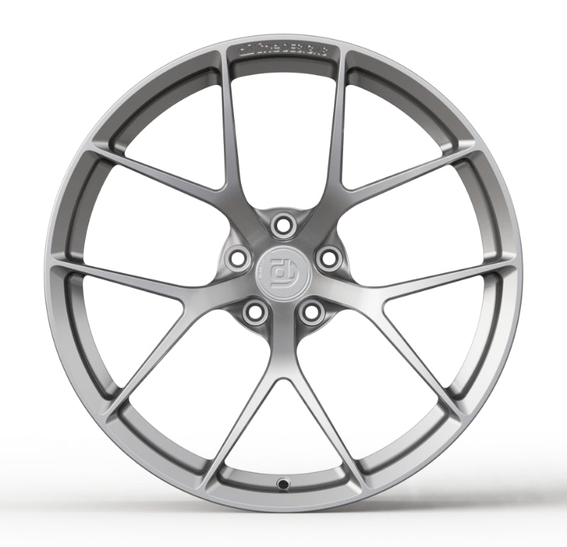 Car wheel rim with a brand logo on a white background