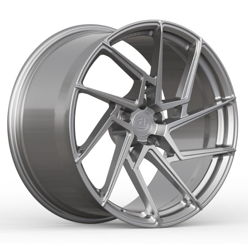 Silver alloy wheel on a white background
