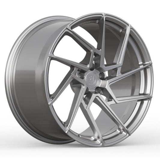 Silver alloy wheel on a white background