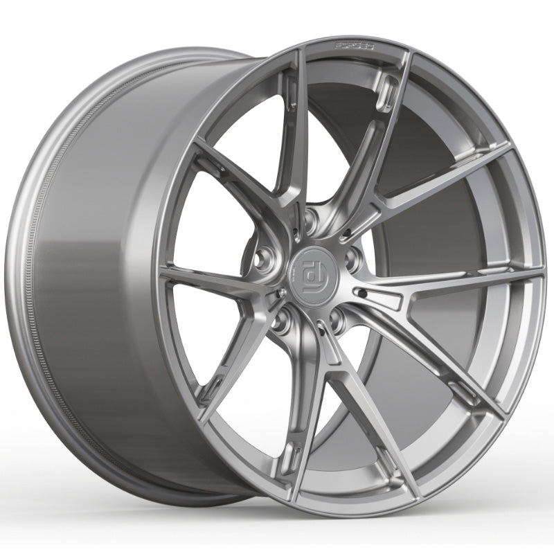 Silver alloy wheel on a white background