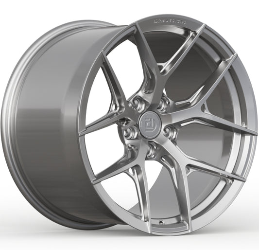 Silver alloy wheel on a white background