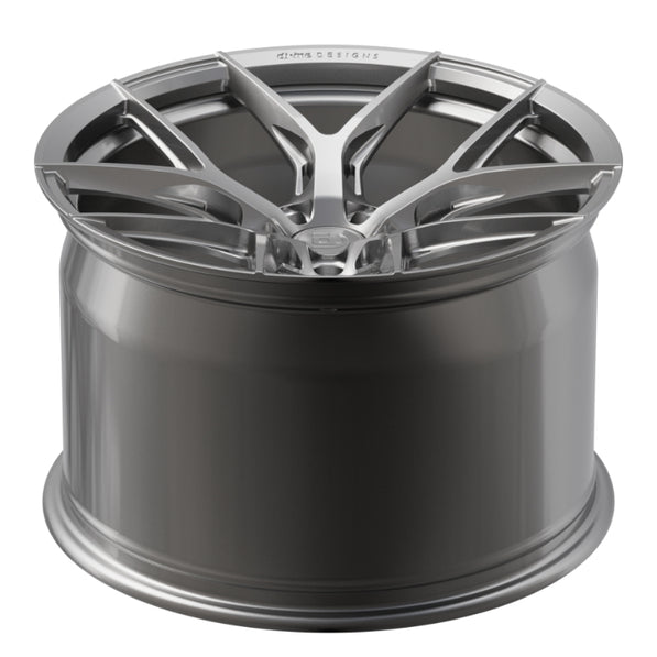 Car wheel with a metallic finish on a white background