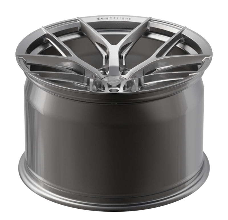 Car wheel with a metallic finish on a white background