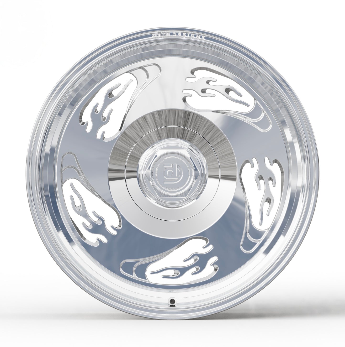 Chrome car wheel with decorative flame cutouts on a white background